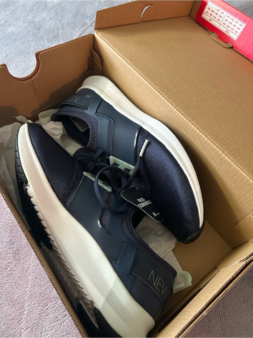 Women’s 8 New Balance FeulCore Navy and White